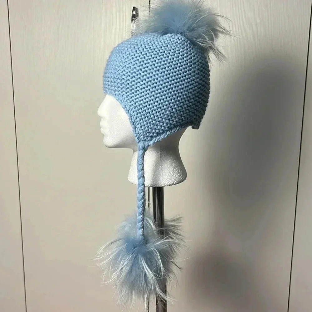 Knitted kids hat with fur pom poms for ages 2-4